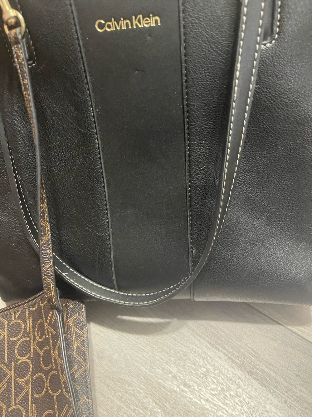 (Not sure if it’s authenticCalvin Klein Black Leather Laptop Tote with Gold Logo